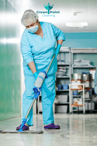 Janitorial cleaner in medical facility cleaning floors in Charlotte NC.